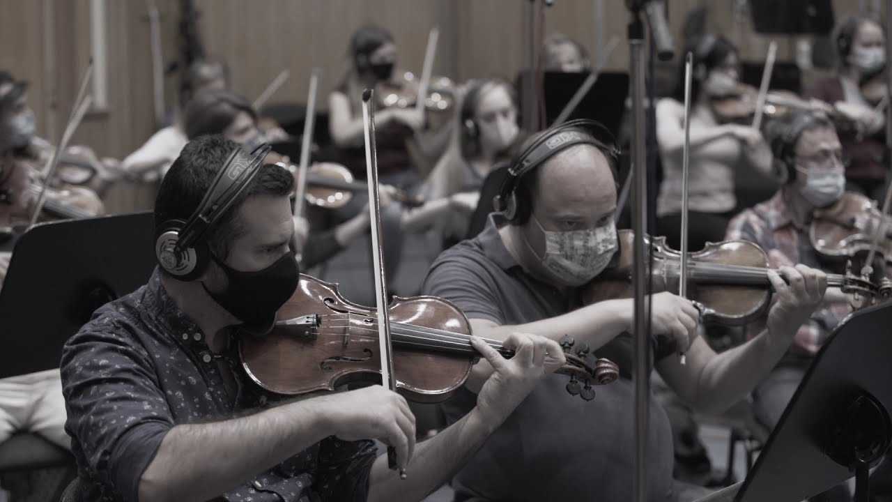 The string section of Budapest Scoring orchestra in face masks recording the soundtrack for "Swanenburg"